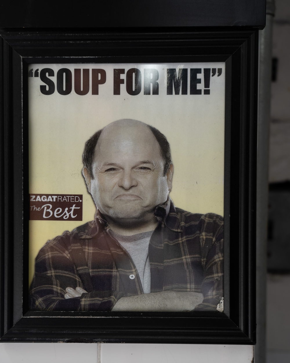 A framed poster on the wall at The Original Soup Kitchen: Soup for me! Zagat rated, the best